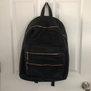 Honest Company black vegan leather backpack